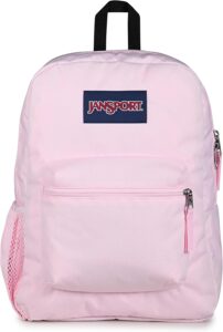 JanSport Cross Town Backpack in Blue Dusk with large main compartment, front organizer pocket, side water bottle pocket, and padded shoulder straps for elementary school students