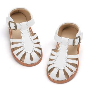White Felix & Flora toddler dress sandals with cushioned footbed, hook-and-loop strap, and non-slip rubber sole White Felix & Flora toddler dress sandals with cushioned footbed, hook-and-loop strap, and non-slip rubber sole