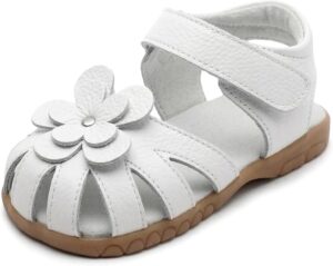 White Femizee princess sandals for toddler girls with closed toe design, flower detail, and leather construction White Femizee princess sandals for toddler girls with closed toe design, flower detail, and leather construction