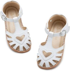 White THEE BRON toddler T-strap sandals with heart cutout details and hook-and-loop strap White THEE BRON toddler T-strap sandals with heart cutout details and hook-and-loop strap