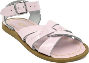 Toddler wearing Salt Water Original leather sandals with adjustable straps and rubber sole for summer outdoor play