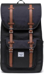 Black Herschel Little America 30L backpack with padded shoulder straps, front pocket, magnetic strap closures, and side water bottle pockets