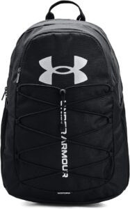 Under Armour Hustle Backpack in silver with padded shoulder straps, front bungee storage, and side water bottle pockets