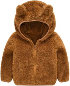 Toddler wearing a soft teddy bear hoodie jacket with bear ears, zip-up front, and cozy fleece-style fabric for fall and winter weather