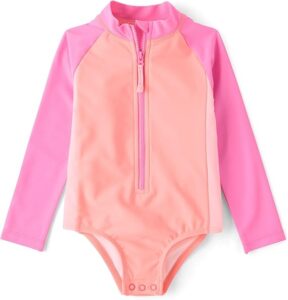 Toddler girl long sleeve colorblock rashguard one-piece swimsuit with UPF 50+ sun protection and half-zip front for beach and pool days Toddler girl long sleeve colorblock rashguard one-piece swimsuit with UPF 50+ sun protection and half-zip front for beach and pool days