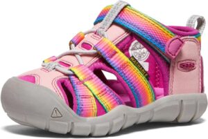 Kids KEEN Seacamp II CNX water sandals in rainbow festival colors with closed toe design and secure straps for outdoor play Kids KEEN Seacamp II CNX water sandals in rainbow festival colors with closed toe design and secure straps for outdoor play