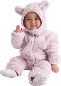 The North Face Baby Campshire One-Piece in soft fleece with an attached bear-ear hood, built-in booties, fold-over mittens, and an asymmetrical front zipper