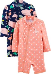 Toddler wearing a Simple Joys by Carter's one-piece rashguard swimsuit with UPF 50+ sun protection during beach, pool, or splash pad play Toddler wearing a Simple Joys by Carter's one-piece rashguard swimsuit with UPF 50+ sun protection during beach, pool, or splash pad play