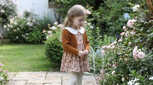 Toddler girl floral print long-sleeve dress paired with a coordinating solid cardigan for a fall or winter outfit